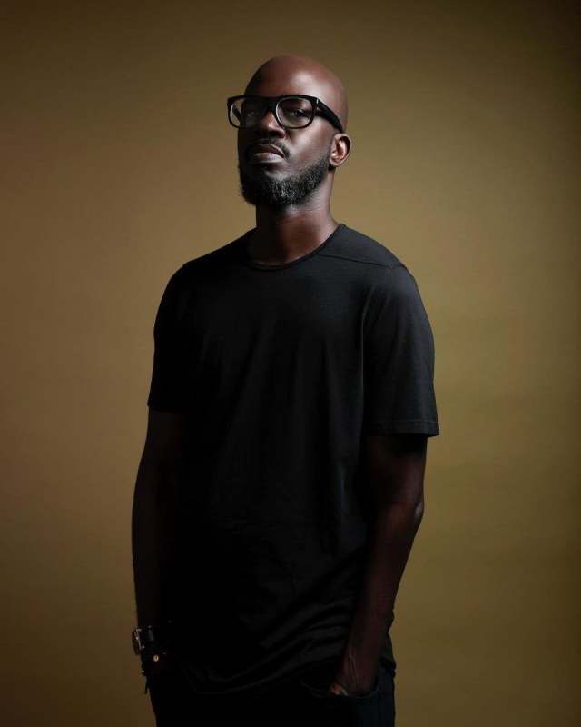 DJ Black Coffee pictured on a Times Square billboard in New York City