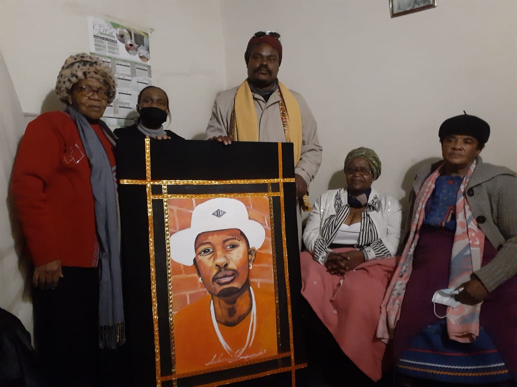 Photos: Rasta honours Killer Kau – family accepts portrait with open arms