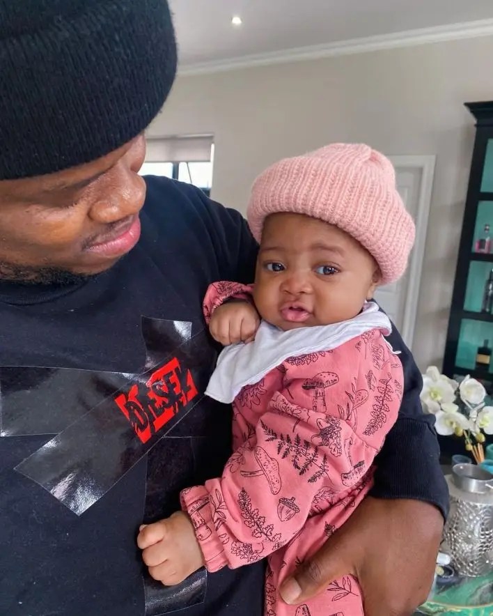 Mzansi divided over who baby Asante looks like – Photos
