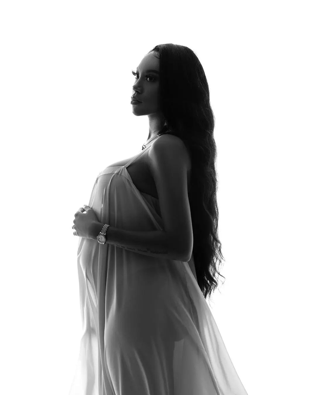 Andile Mpisane’s wife Tamia Mpisane shows off baby bump – Photos