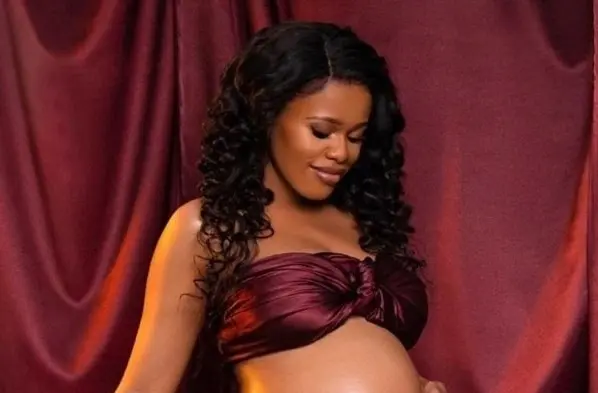 PIC: Pregnant Natasha Thahane shows off her growing baby bump in a beautiful traditional attire