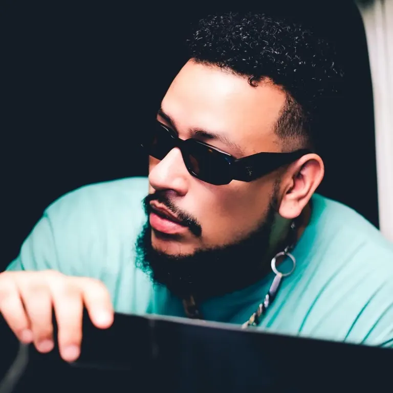 AKA shows off his new BMW car