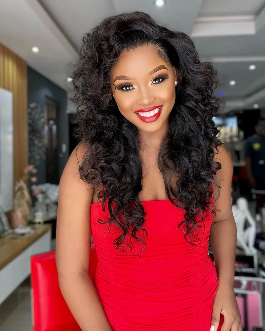 Actress Nelisiwe Sibiya tease fans with a hot photo lying on the bed