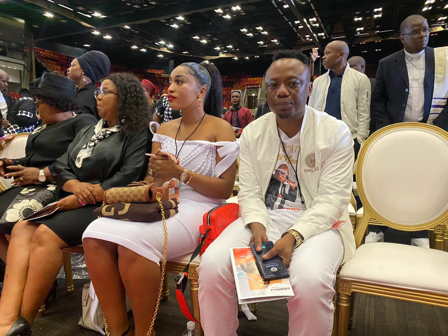 DJ Tira receives a call from a mystery lady during Mampintsha’s Funeral service