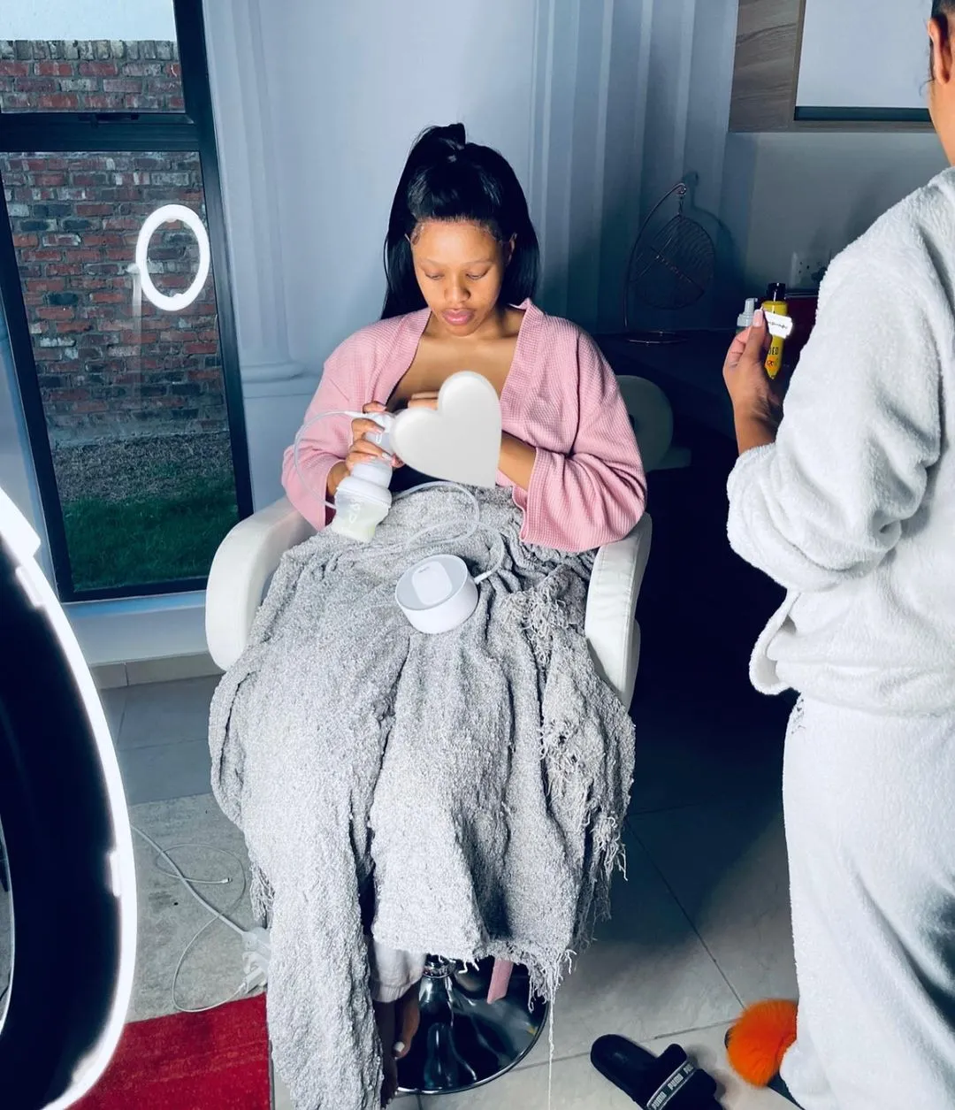 Natasha Thahane shows off her Baby playing with a Piano