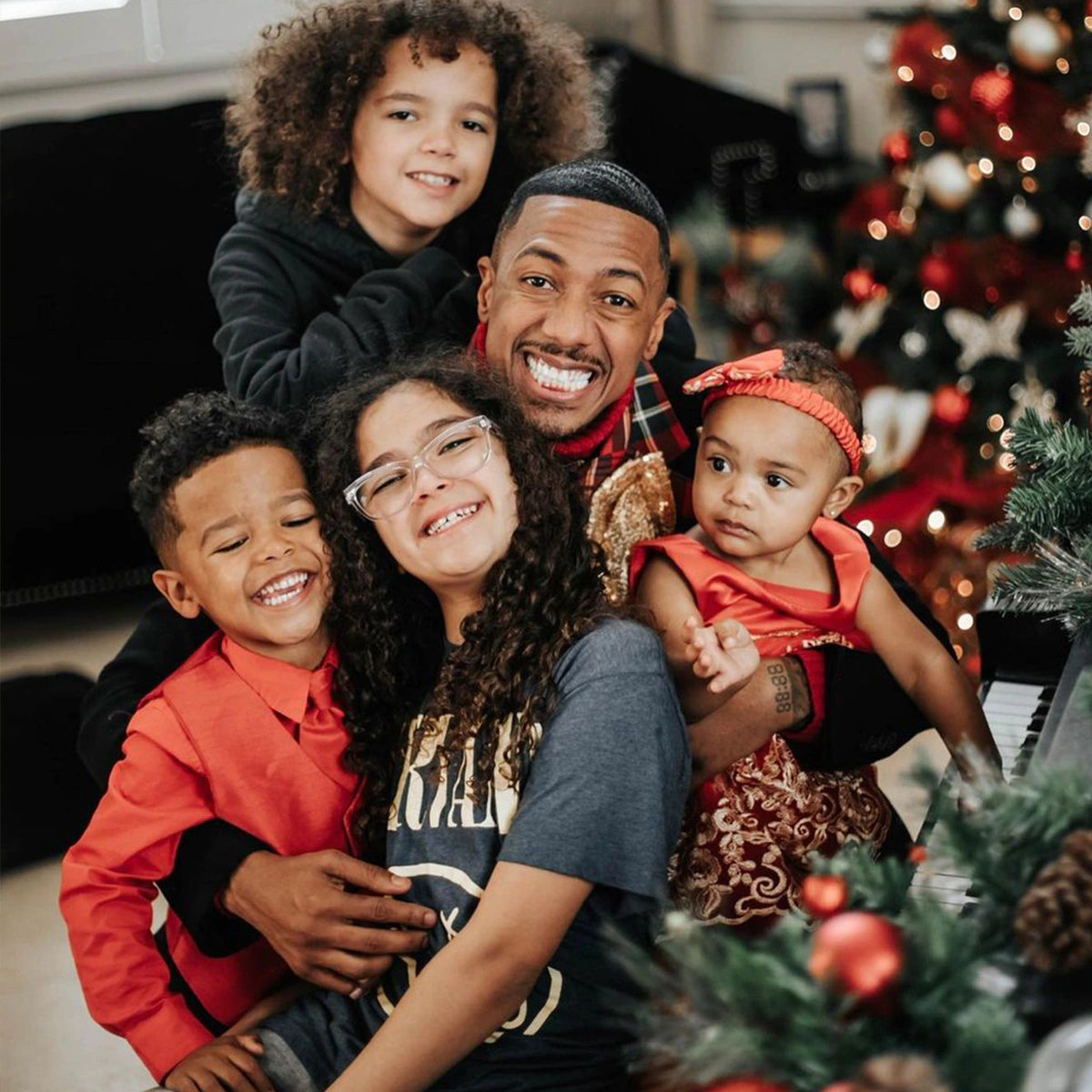 Nick Cannon Poses With His Kids for Holiday Family Photos
