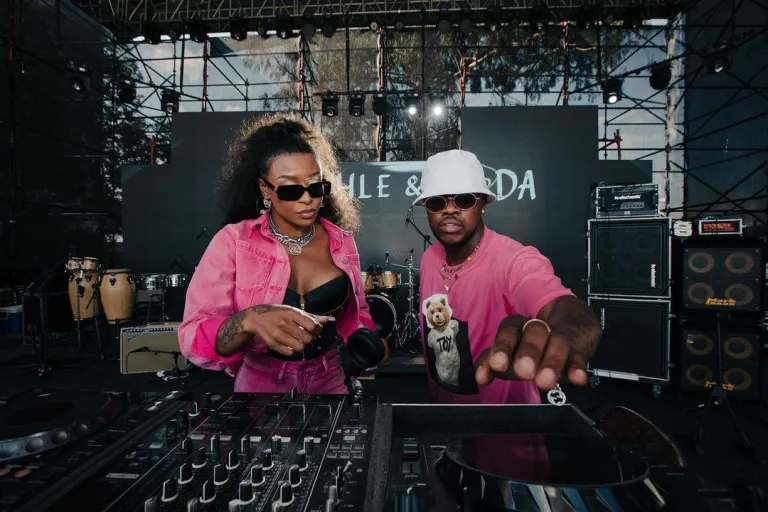 Murdah Bongz and DJ Zinhle having a good moment while performing at a show