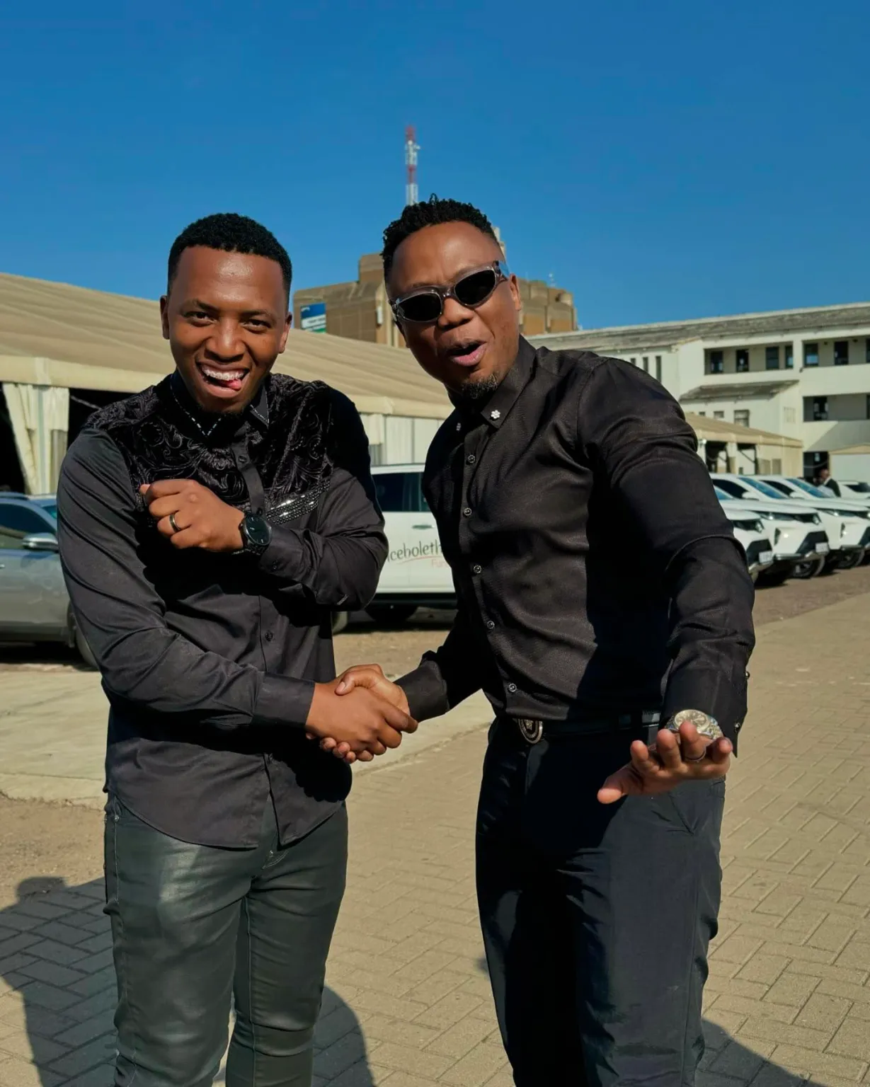 DJ Tira and Dumi Mkokstad kiss and make up